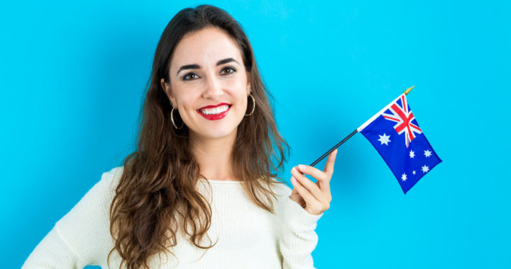 Young woman holding Australian flag